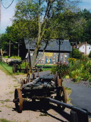Log Shed with farm wagon 
